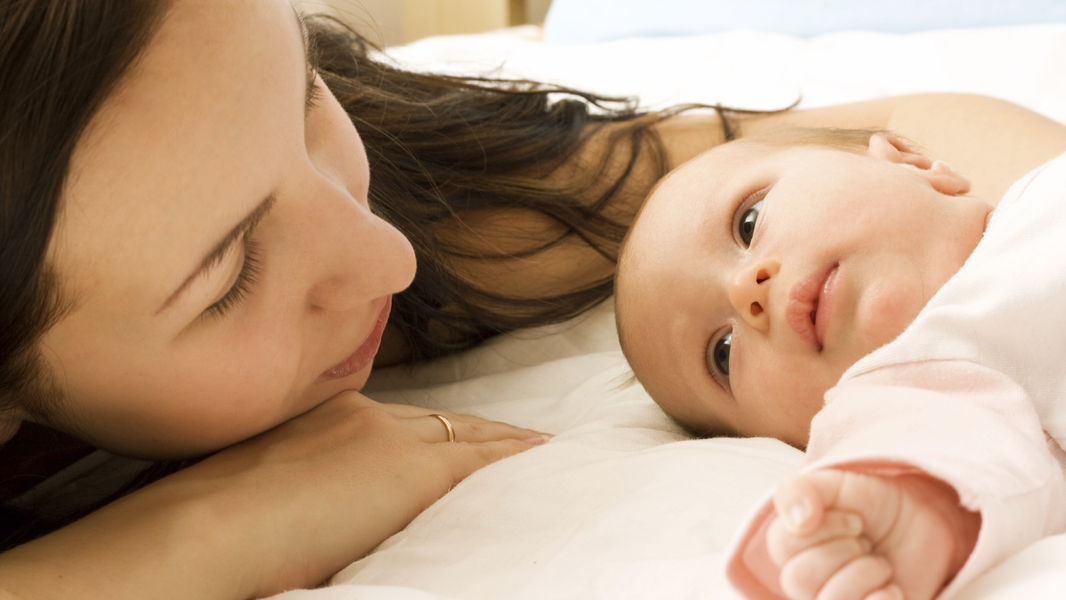 Mother looking at her baby.
