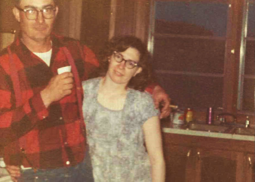 Adaline and Gerald embrace one another at their home many years ago.