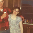 Adaline and Gerald embrace one another at their home many years ago.