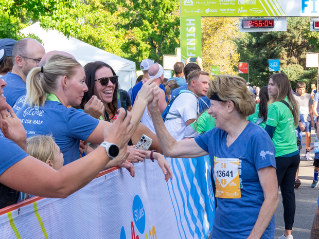 Spectator congratulates a FitOne finisher.