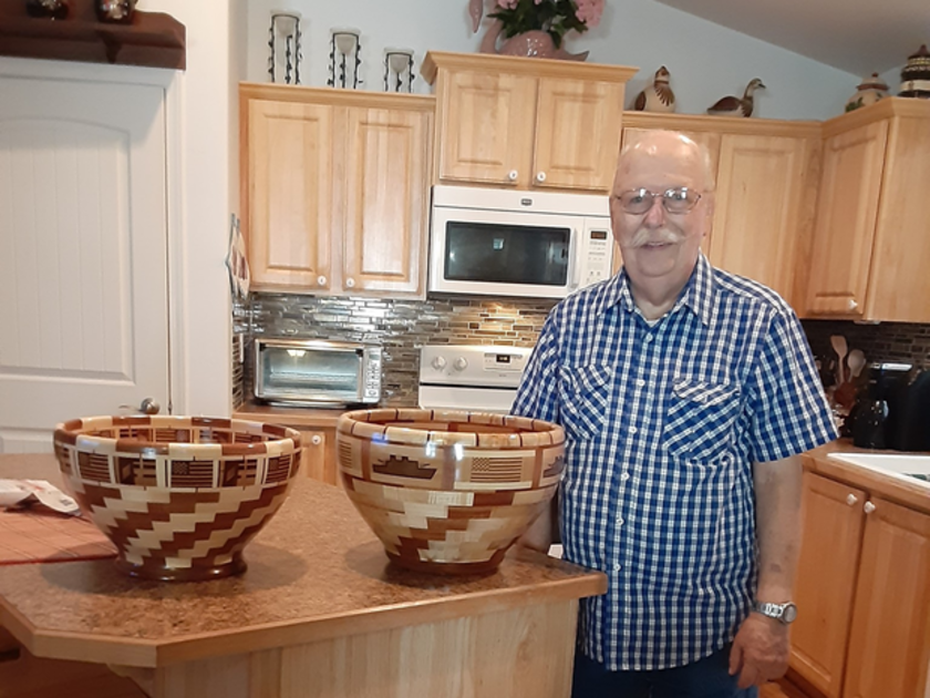 Patient in kitchen of his home.