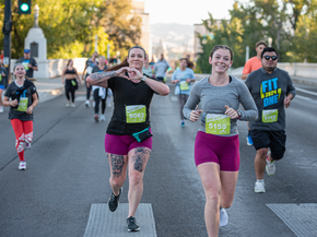 Two women running the FitOne 10K
