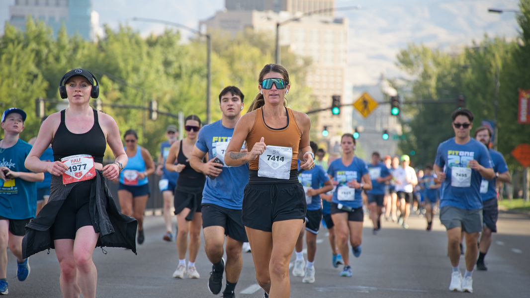 Group of runners on Capitol Blvd. during FitOne