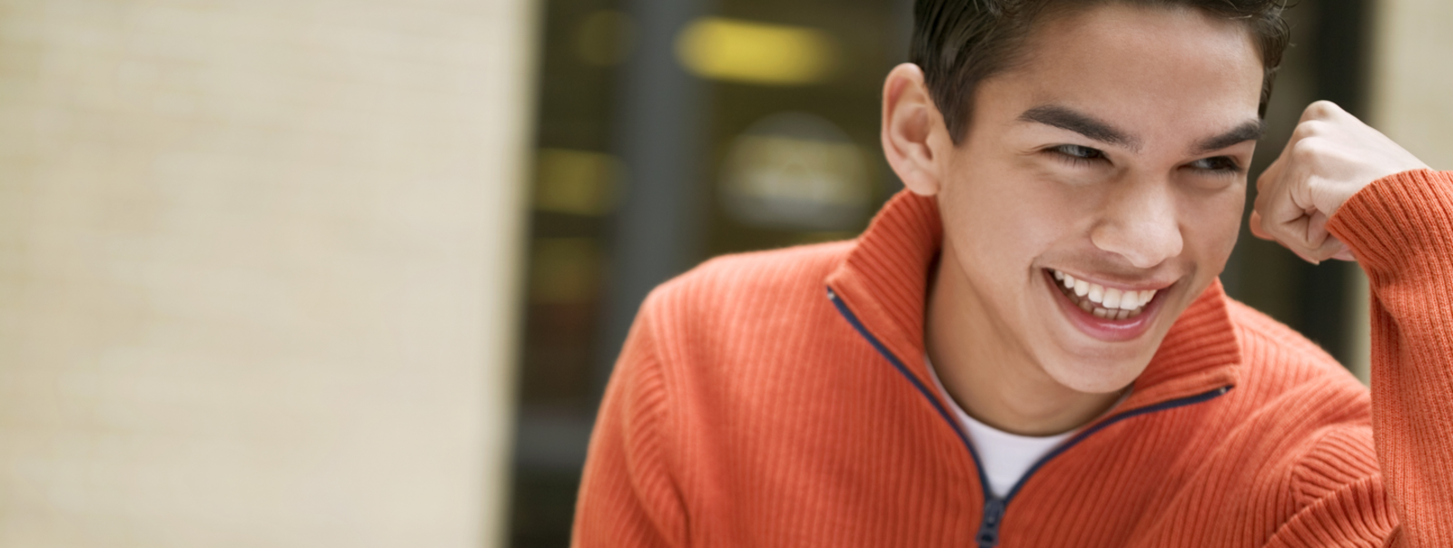Teen boy with open book