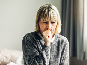 mature woman coughing