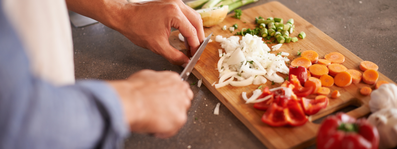 Cook dicing veggies